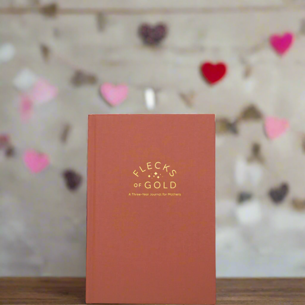 Teracotta Linen Flecks of Gold Journal with gold embossing. A Three-Year Journal For Mothers. Helping you find the joy in Motherhood. A journal for moms who want to see the good in every day. Helping overwhelmed, busy moms. Created by Rachel Nielson of 3 in 30 Podcast. Motherhood Journal.  Gratitude Journal.