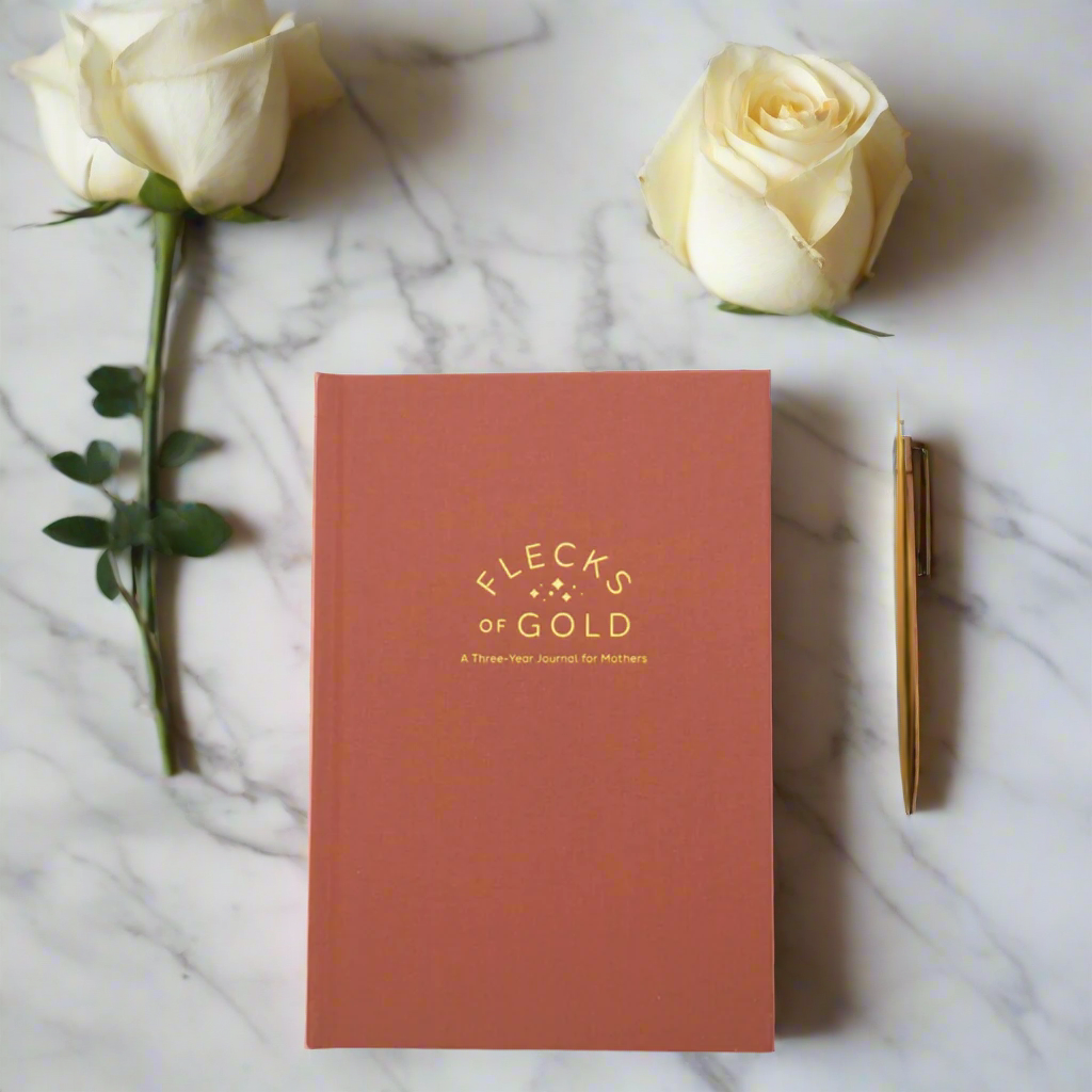 Teracotta Linen Flecks of Gold Journal with gold embossing. A Three-Year Journal For Mothers. Helping you find the joy in Motherhood. A journal for moms who want to see the good in every day. Helping overwhelmed, busy moms. Created by Rachel Nielson of 3 in 30 Podcast. Motherhood Journal.  Gratitude Journal.
