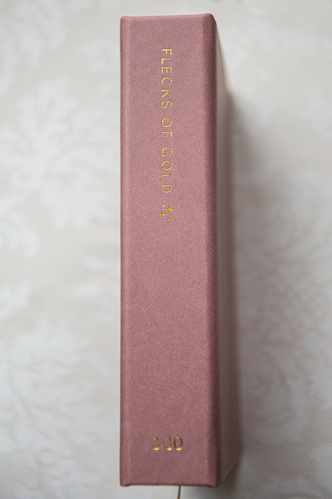 Vegan Rose Flecks of Gold Journal with gold embossing. A Three-Year Journal For Mothers. Helping you find the joy in Motherhood. A journal for moms who want to see the good in every day. Helping overwhelmed, busy moms. Created by Rachel Nielson of 3 in 30 Podcast. Motherhood Journal. Gratitude Journal.