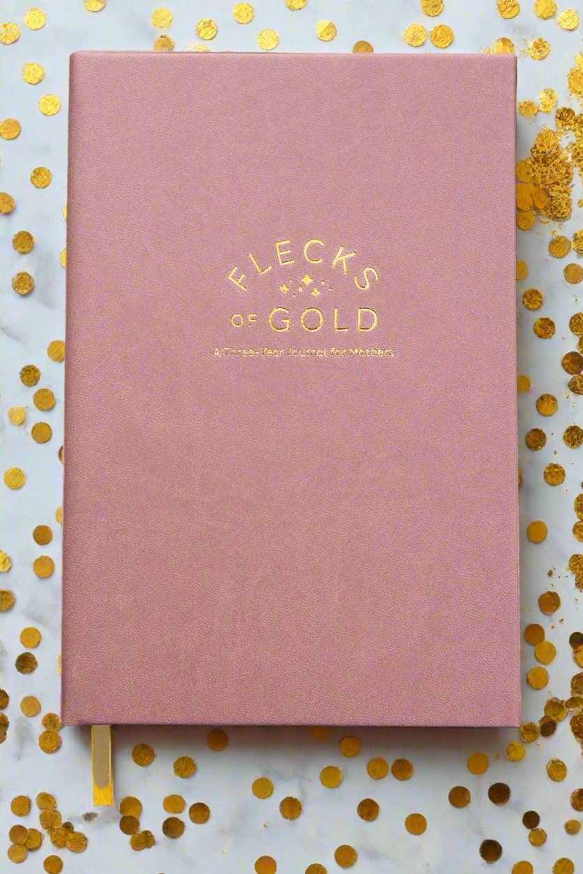 Vegan Rose Flecks of Gold Journal with gold embossing. A Three-Year Journal For Mothers. Helping you find the joy in Motherhood. A journal for moms who want to see the good in every day. Helping overwhelmed, busy moms. Created by Rachel Nielson of 3 in 30 Podcast. Motherhood Journal. Gratitude Journal.