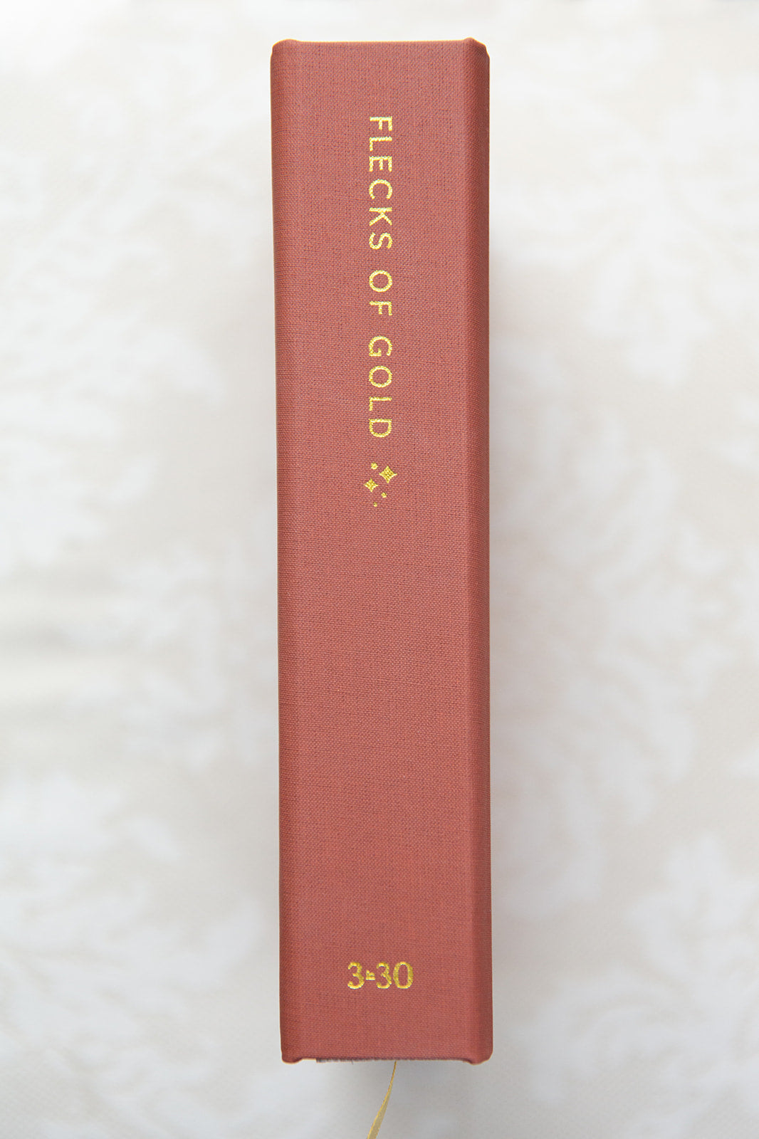 Terracotta Linen Flecks of Gold Journal with gold embossing. A Three-Year Journal For Mothers. Helping you find the joy in Motherhood. A journal for moms who want to see the good in every day. Helping overwhelmed, busy moms. Created by Rachel Nielson of 3 in 30 Podcast.