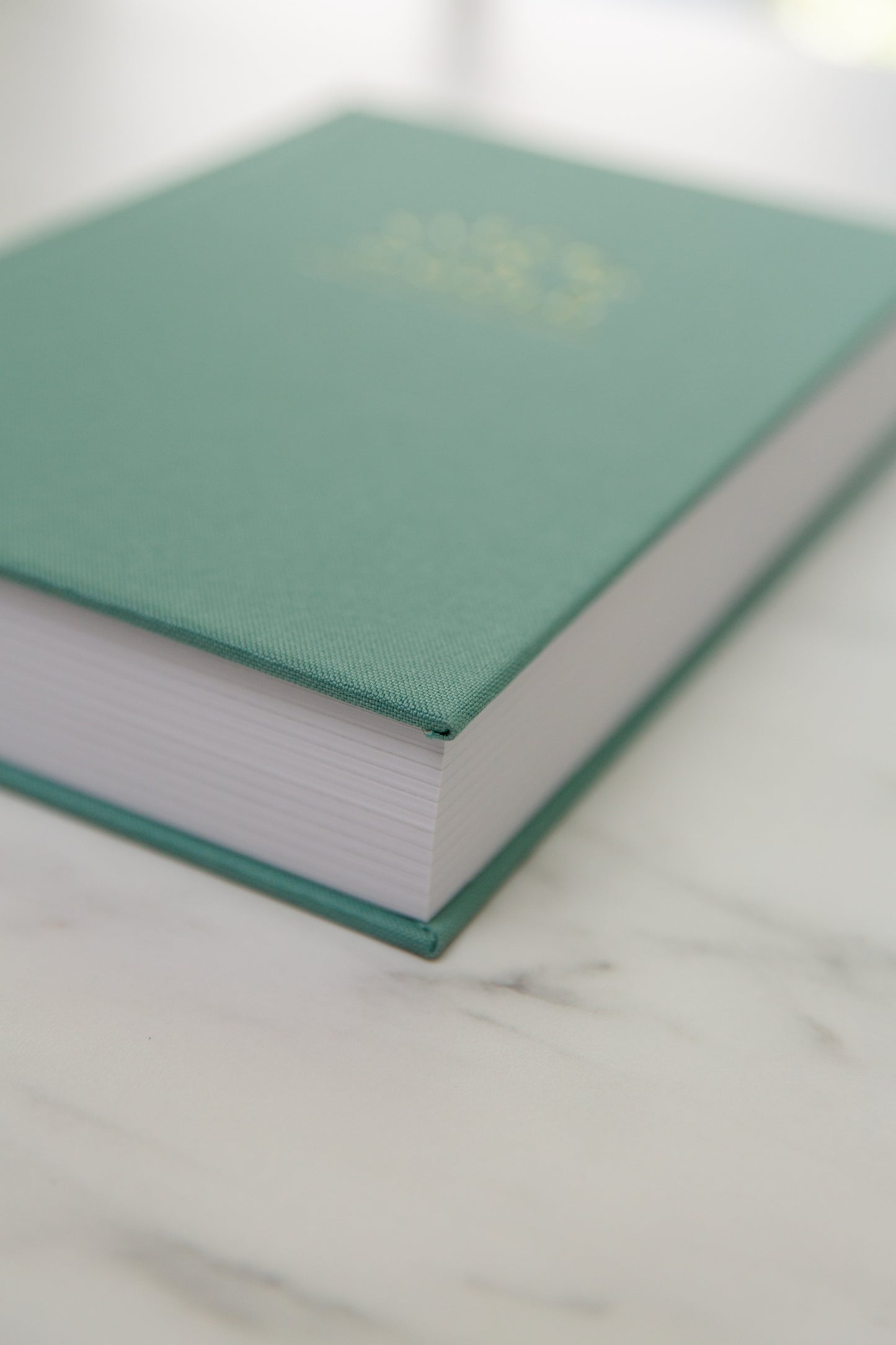 Teal Linen Flecks of Gold Journal with gold embossing. A Three-Year Journal For Mothers. Helping you find the joy in Motherhood. A journal for moms who want to see the good in every day. Helping overwhelmed, busy moms. Created by Rachel Nielson of 3 in 30 Podcast. Motherhood Journal.  Gratitude Journal.