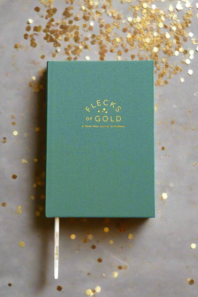 Teal Linen Flecks of Gold Journal with gold embossing. A Three-Year Journal For Mothers. Helping you find the joy in Motherhood. A journal for moms who want to see the good in every day. Helping overwhelmed, busy moms. Created by Rachel Nielson of 3 in 30 Podcast.  Motherhood Journal.  Three-year journal. Gratitude Journal.