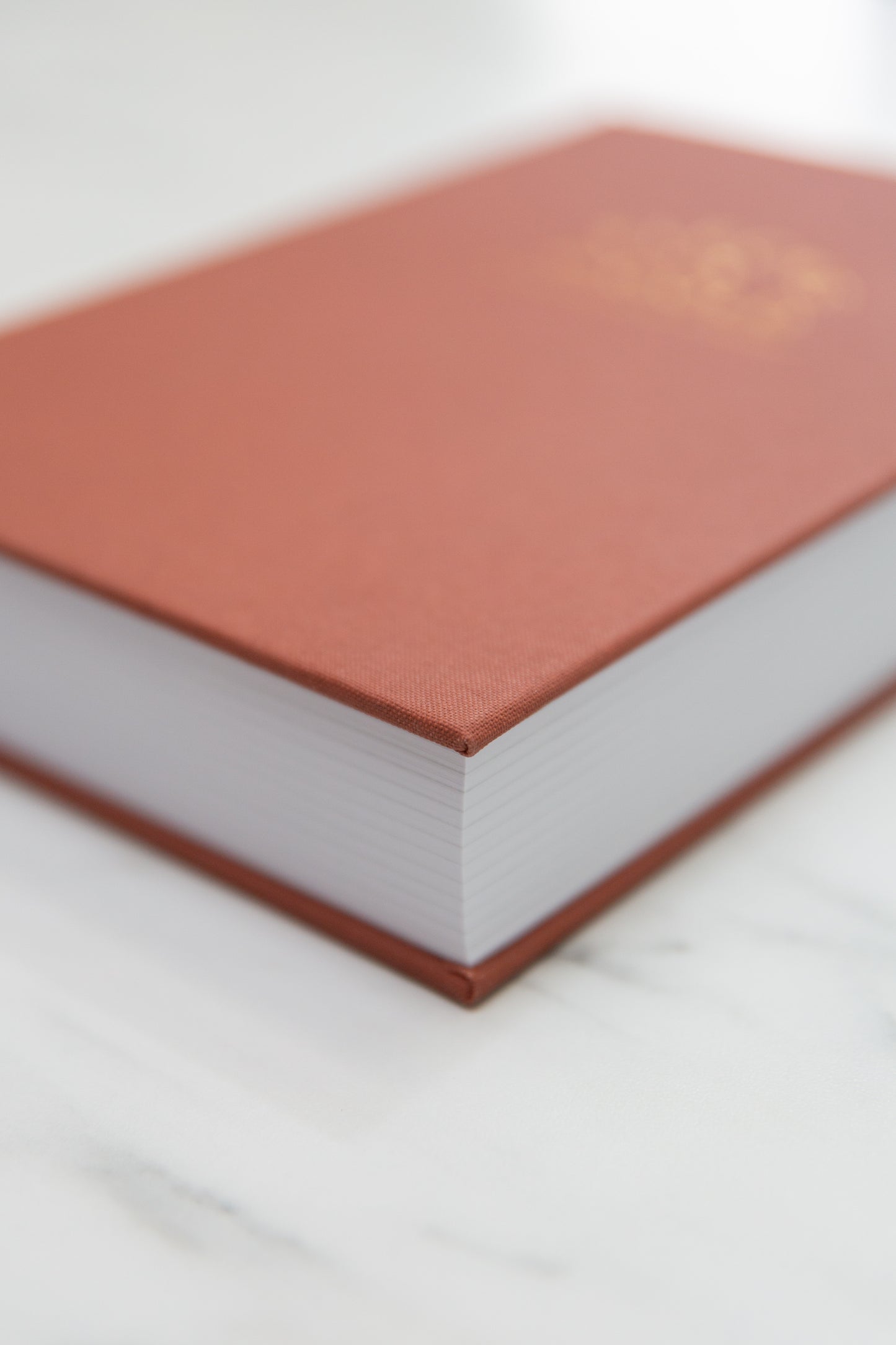Terracotta Linen Flecks of Gold Journal with gold embossing. A Three-Year Journal For Mothers. Helping you find the joy in Motherhood. A journal for moms who want to see the good in every day. Helping overwhelmed, busy moms. Created by Rachel Nielson of 3 in 30 Podcast.